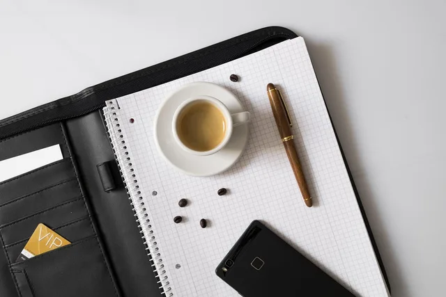 coffee, espresso, coffee beans, beans, cup, write, pen, ink pen, writing implement, office, meeting, coffee cup, business, coffee pot, folder, leather wallet, vip, business card. The real cost of insuring a bookkeeping firm