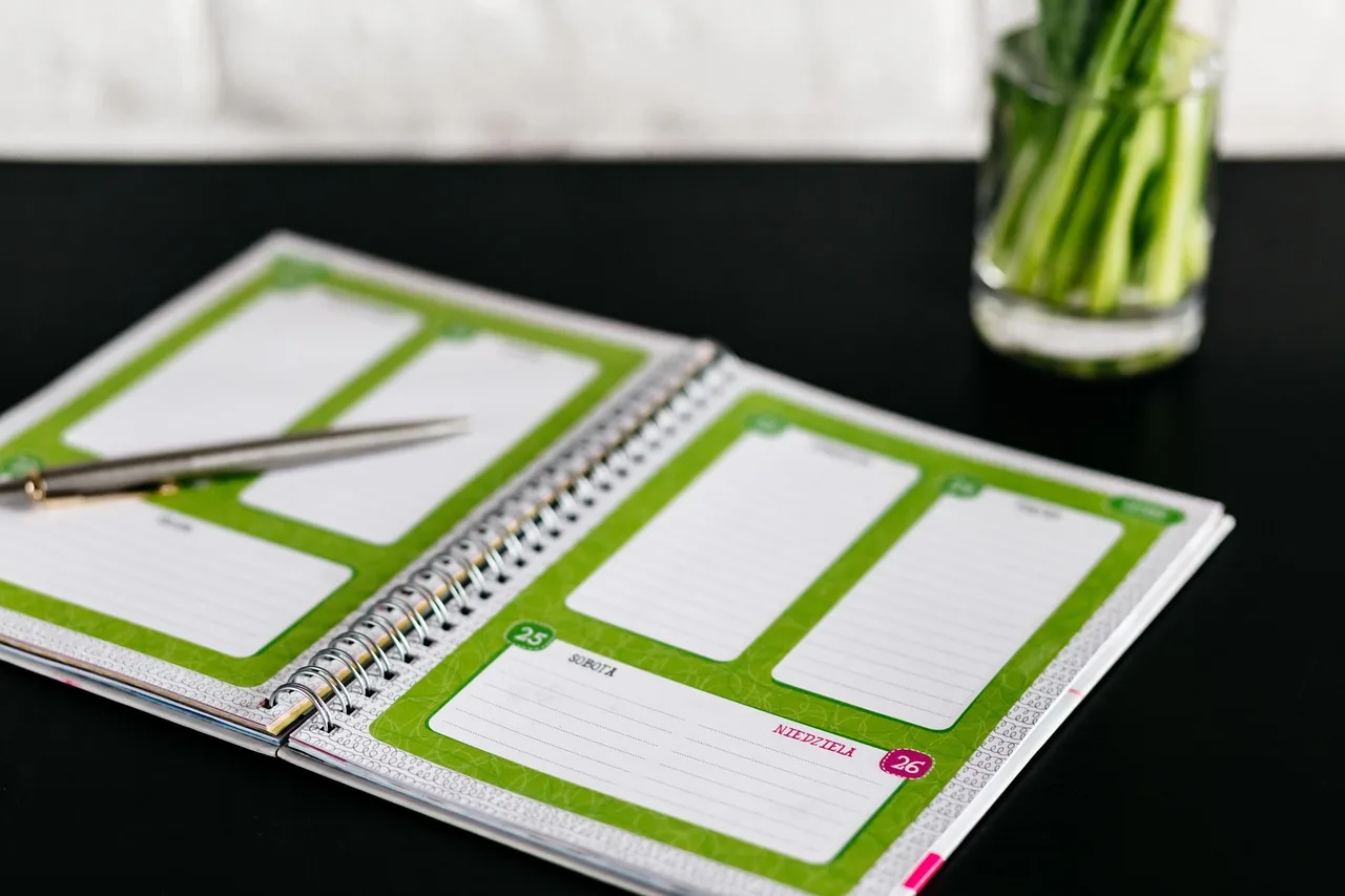 green, vase, interior, display, business, office, work, desk, table, notebook, pen. Bookkeeping Firm Scheduling: Deadlines and Capacity